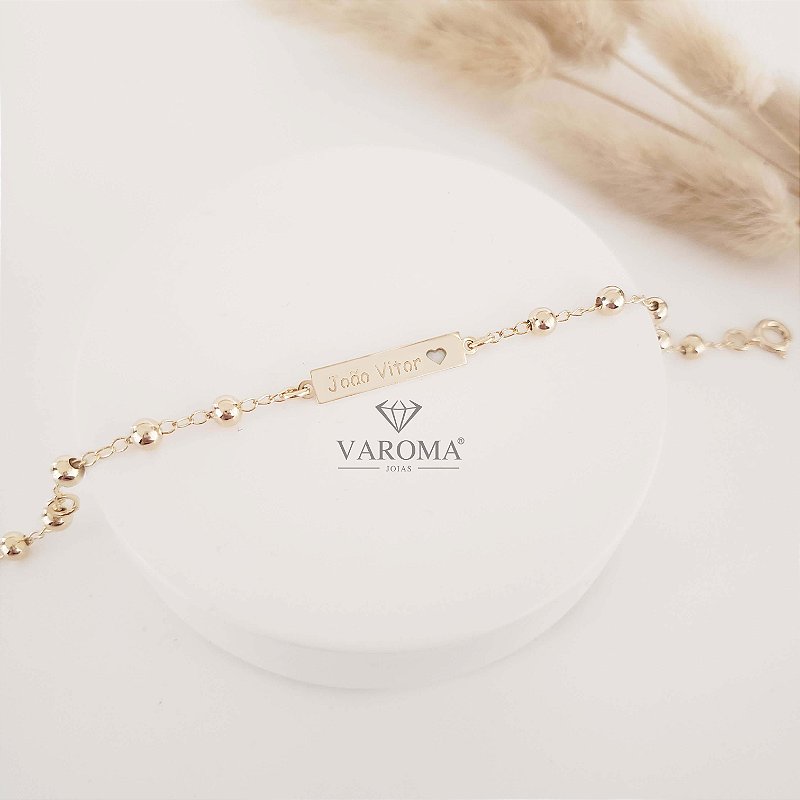 Pulseira infantil personalizável com plaquinha e coração e bolinhas banhado em ouro 18k