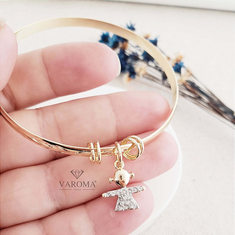 Bracelete com pingente de menino ou menina cravejado com zircônias banhado em ouro 18k