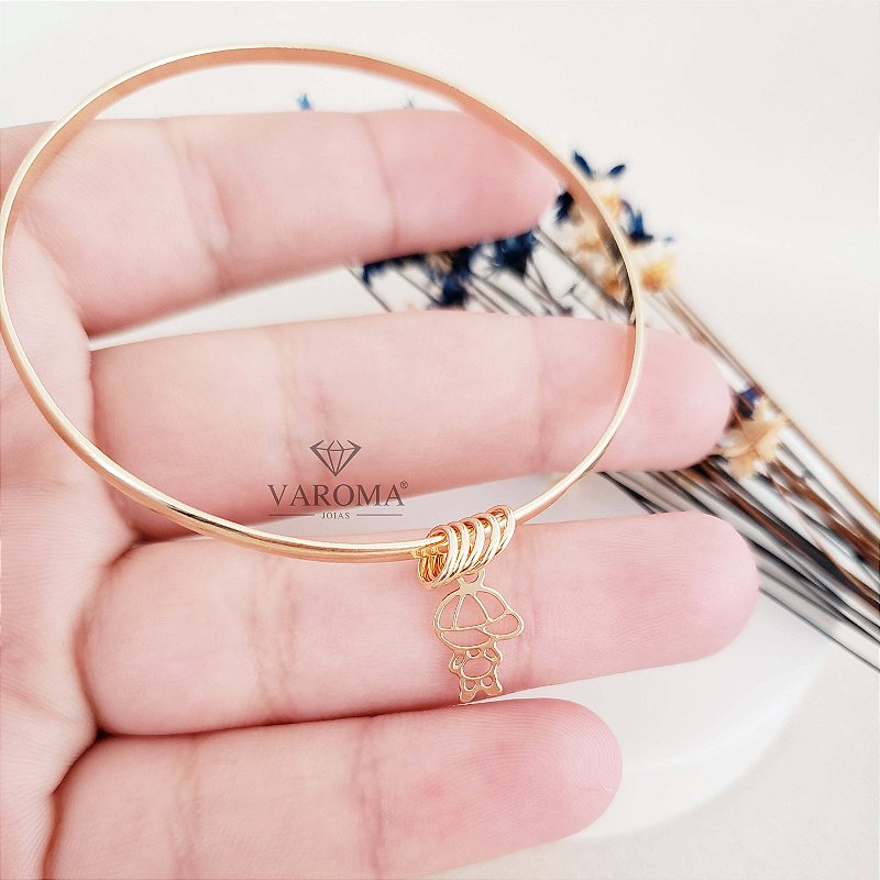 Bracelete  com pingente de menino ou menina banhado em ouro 18k