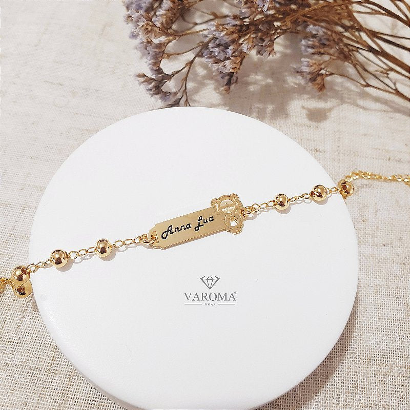 Pulseira infantil personalizável com plaquinha e bolinhas banhado em ouro 18k