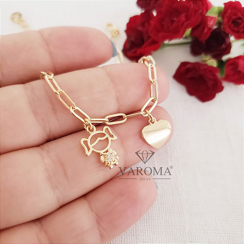 Pulseira com coração liso e menino/menina cravejado banhado em ouro 18k