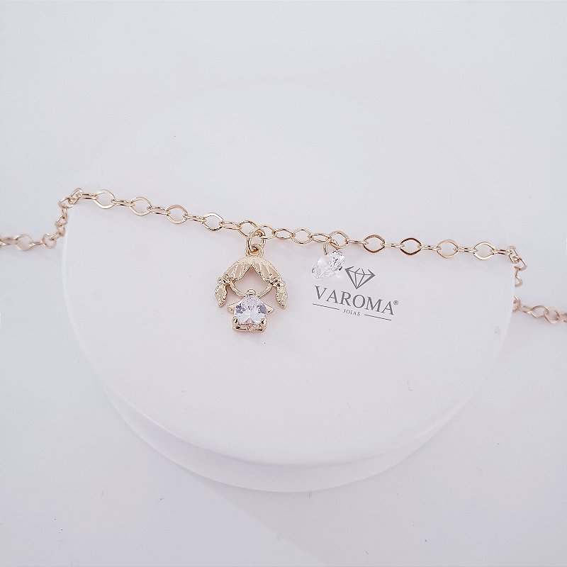 Pulseira com pingente de menino ou menina cravejado e com ponto de luz banhado em ouro 18k