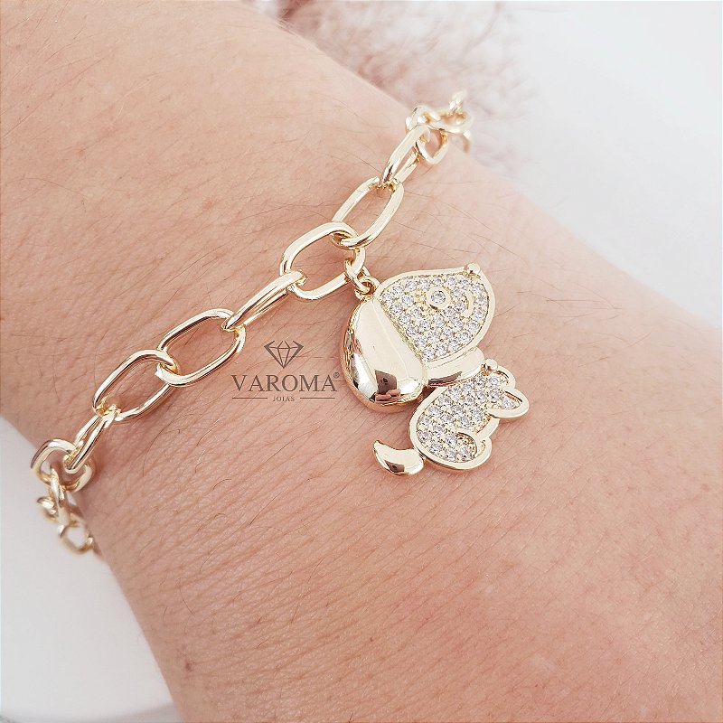 Pulseira com pingente de cachorrinho cravejado com zircônias banhada em ouro 18k