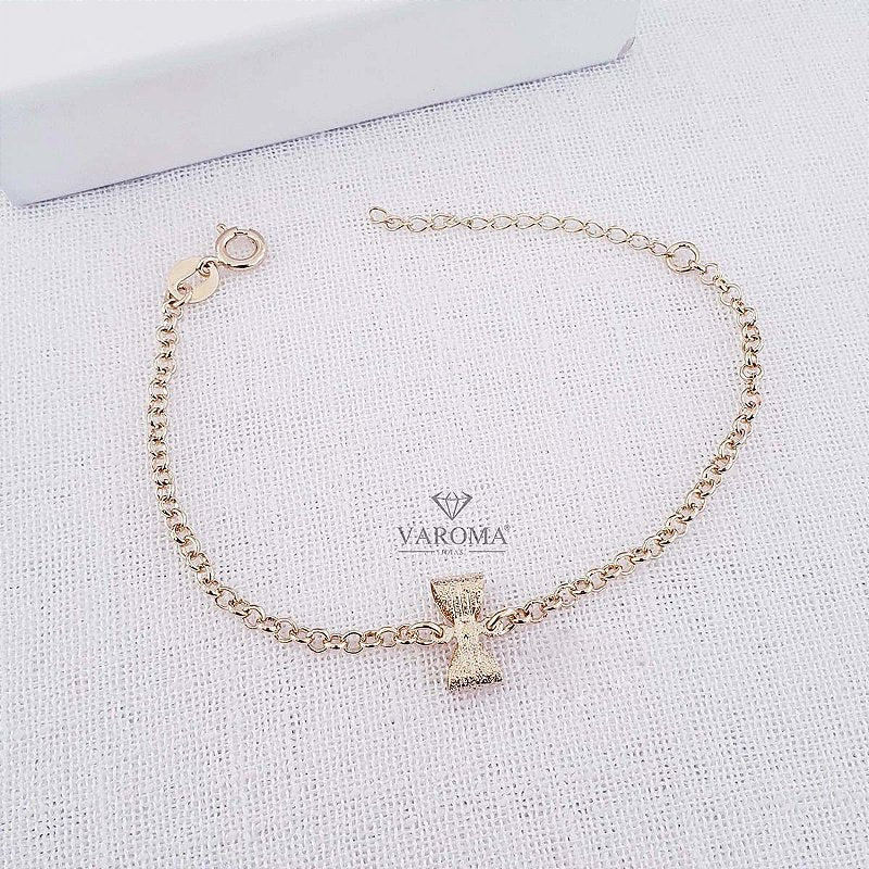 Pulseira infantil com lacinho banhada em ouro 18k